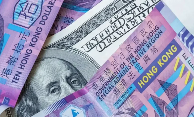 هونغ كونغ تدافع عن ربط عملتها بالدولار الأمريكي بشراء قياسي للعملة الخضراء 1 hong Detafour